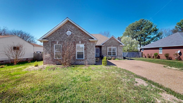 510 Castleview Dr, Lebanon, TN 37087 - view of front of house with brick siding, fence, a front lawn, and a chimney