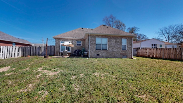 510 Castleview Dr, Lebanon, TN 37087 - rear view of property with a fenced backyard, crawl space, brick siding, a shingled roof, and a lawn
