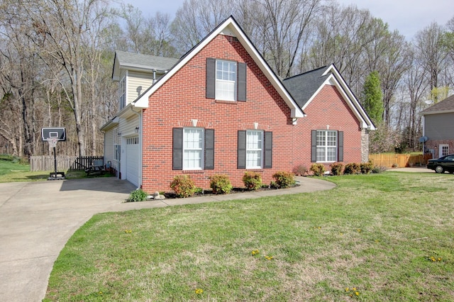 4425 Taylor Hall Ln, Adams, TN 37010 - traditional-style house featuring fence, a garage, brick siding, a front lawn, and driveway