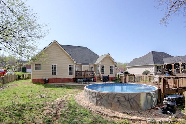 4425 Taylor Hall Ln, Adams, TN 37010 - view of swimming pool with a fenced in pool, a wooden deck, a yard, and a fenced backyard