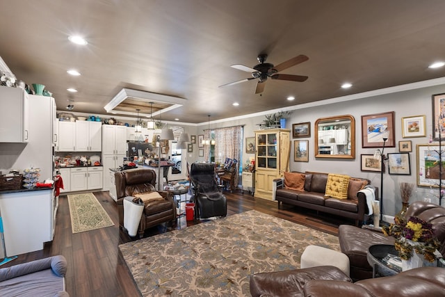 living room featuring recessed lighting, crown molding, dark wood-type flooring, and a ceiling fan