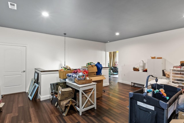 misc room with baseboards, visible vents, wood finished floors, and recessed lighting