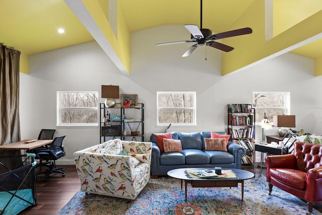 living room featuring high vaulted ceiling, ceiling fan, and wood finished floors