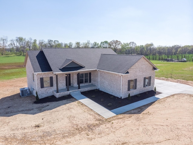 view of front of property with a shingled roof