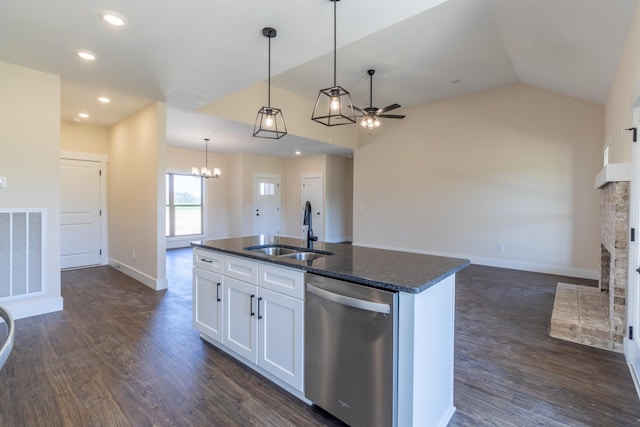 kitchen with ceiling fan with notable chandelier, dark wood finished floors, visible vents, dishwasher, and a sink