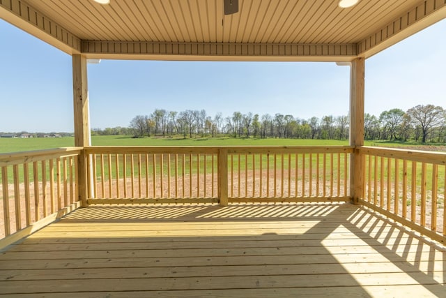 wooden terrace with a rural view