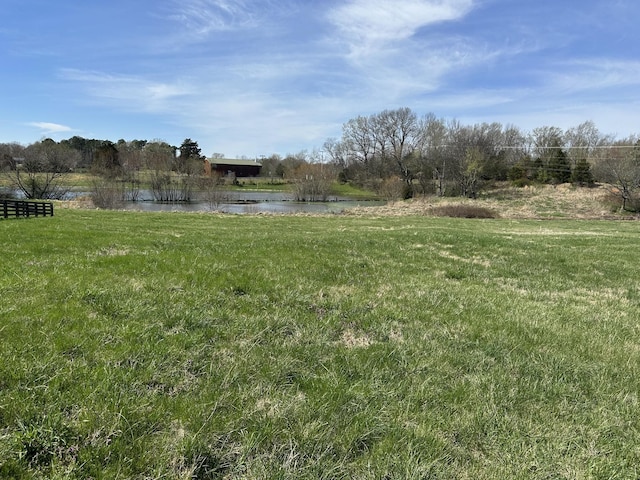 view of yard with a water view