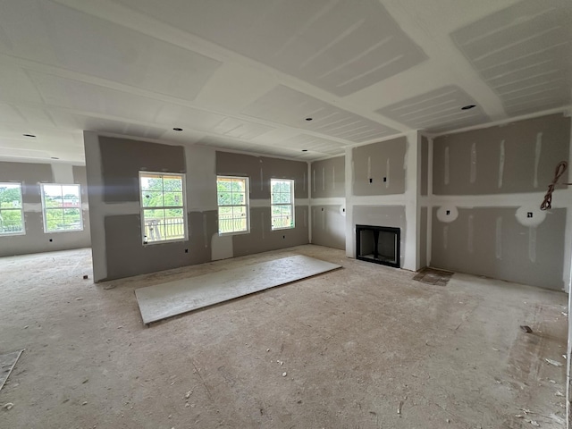 unfurnished living room featuring a fireplace