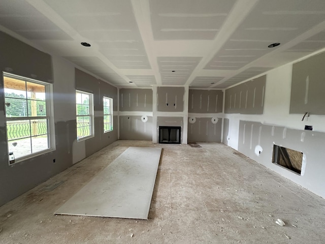 unfurnished living room featuring a fireplace