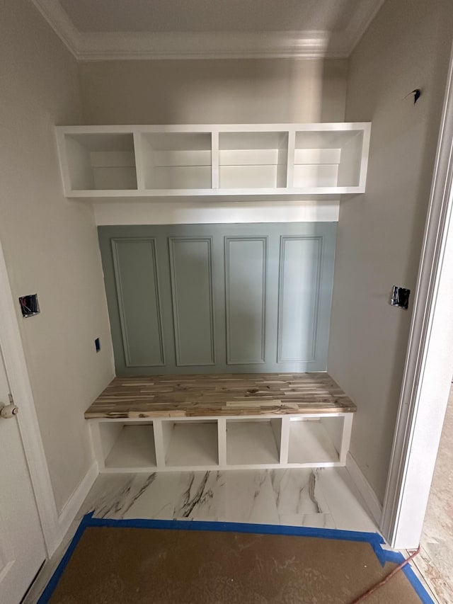 230 Hall Ct, Clarksville, TN 37043 - mudroom with marble look tile flooring, crown molding, and baseboards