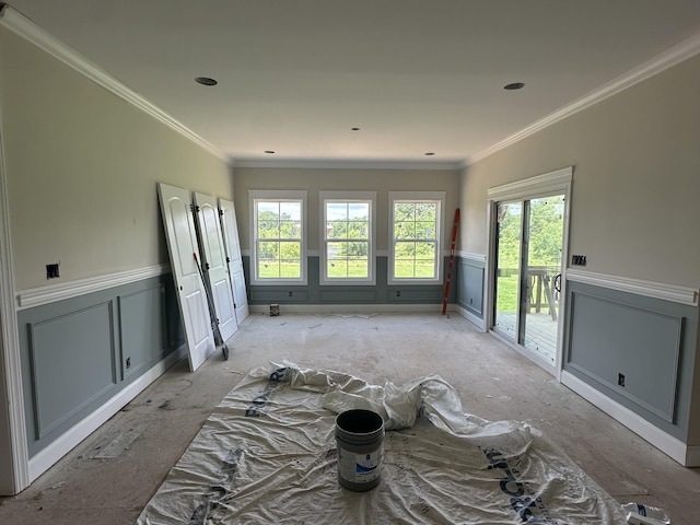 230 Hall Ct, Clarksville, TN 37043 - empty room with plenty of natural light, wainscoting, a decorative wall, and ornamental molding