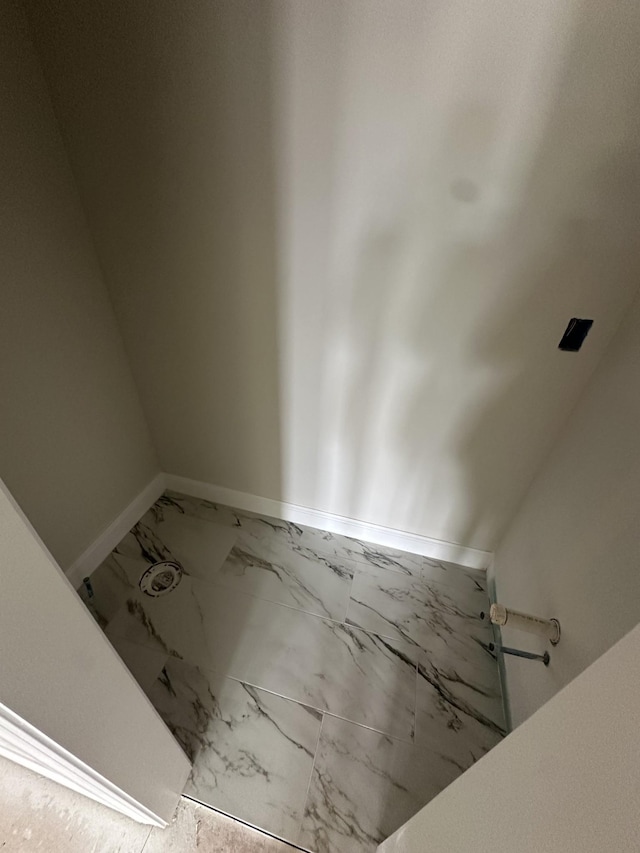 230 Hall Ct, Clarksville, TN 37043 - bathroom featuring marble look tiles and baseboards