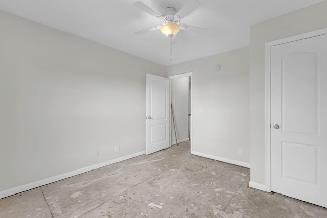 unfurnished bedroom with baseboards and ceiling fan