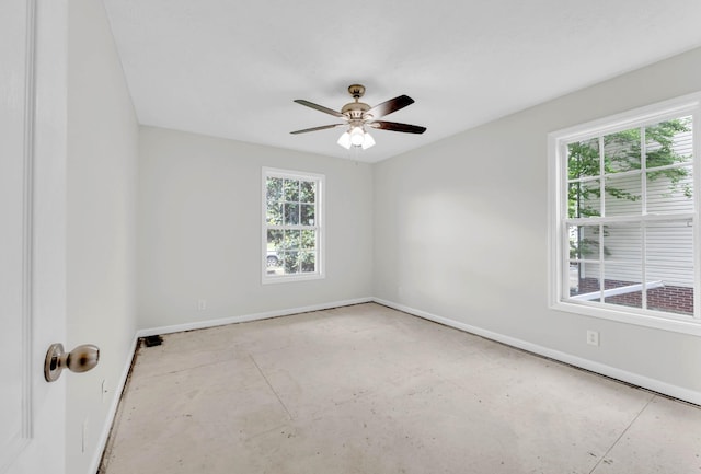 unfurnished room with baseboards, plenty of natural light, and ceiling fan