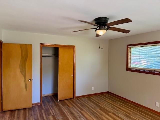 1302 Old Estill Springs Rd, Tullahoma, TN 37388 - unfurnished bedroom featuring a closet, wood finished floors, baseboards, and a ceiling fan