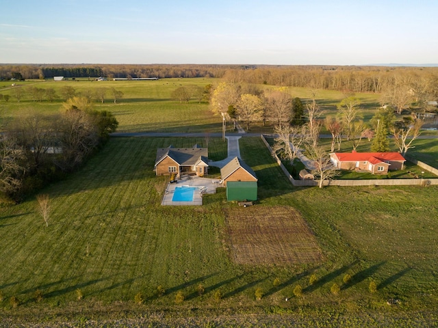 birds eye view of property with a rural view