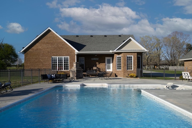 view of pool featuring a patio, fence, and a fenced in pool