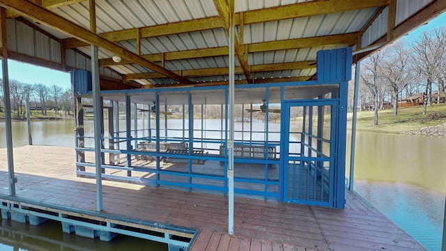 dock area with a water view