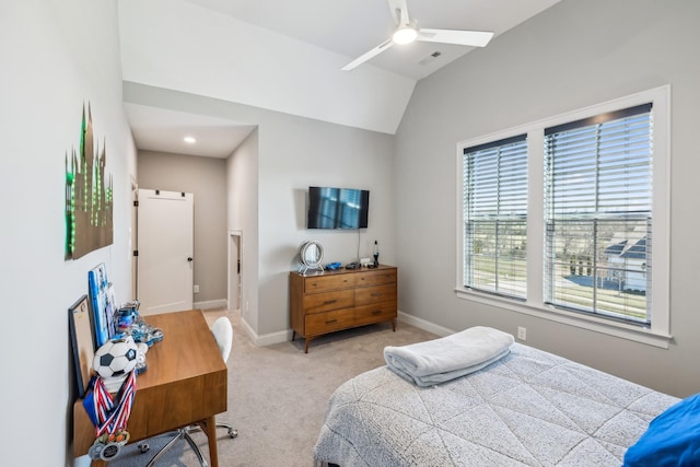bedroom featuring light carpet, lofted ceiling, baseboards, visible vents, and ceiling fan