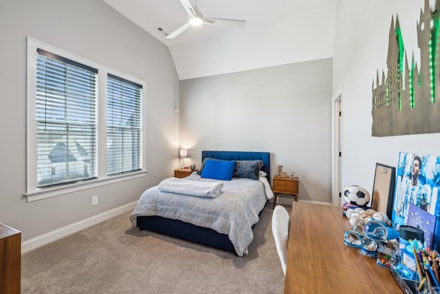 carpeted bedroom with baseboards, lofted ceiling, and ceiling fan