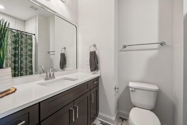 bathroom featuring visible vents, a shower with shower curtain, baseboards, toilet, and vanity