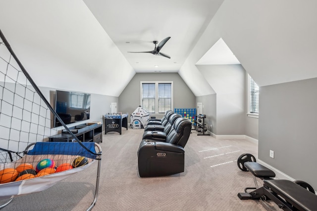 interior space featuring carpet floors, baseboards, lofted ceiling, and ceiling fan
