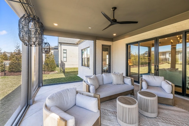 view of patio featuring an outdoor living space and a ceiling fan