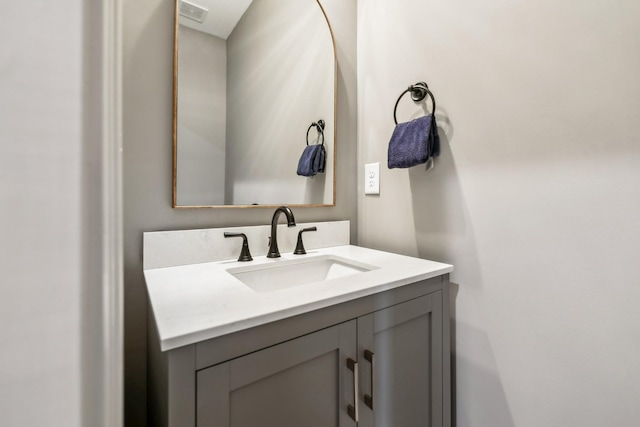 bathroom featuring visible vents and vanity