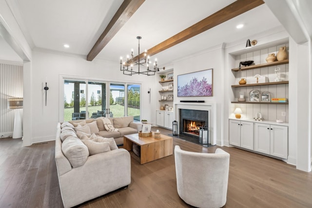 living area featuring a fireplace with flush hearth, beamed ceiling, and wood finished floors