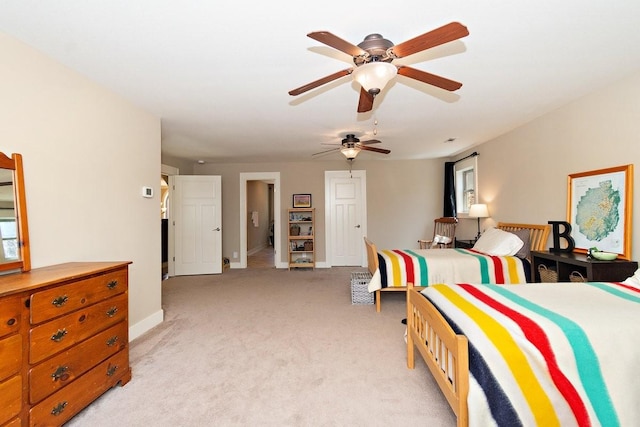 1748 Riverhaven Dr, Adams, TN 37010 - bedroom featuring light carpet, baseboards, and ceiling fan