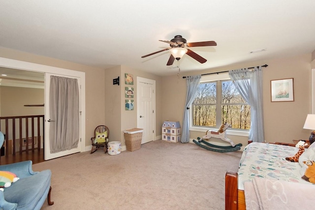 1748 Riverhaven Dr, Adams, TN 37010 - carpeted bedroom featuring baseboards, visible vents, and a ceiling fan