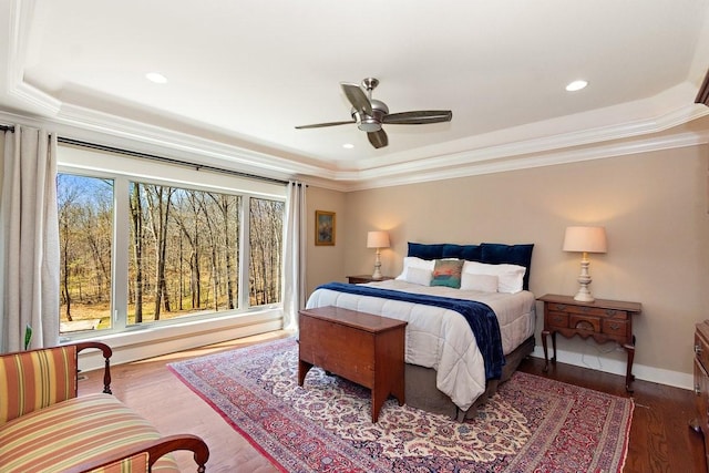 1748 Riverhaven Dr, Adams, TN 37010 - bedroom with baseboards, a tray ceiling, wood finished floors, and crown molding