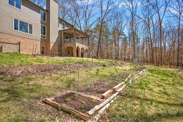 1748 Riverhaven Dr, Adams, TN 37010 - view of yard with a balcony and a vegetable garden