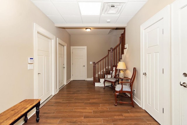 1748 Riverhaven Dr, Adams, TN 37010 - foyer featuring a paneled ceiling, baseboards, stairs, and wood finished floors