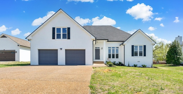 102 Highland Rdg, Hendersonville, TN 37075 - view of front of home with an attached garage, driveway, a front lawn, brick siding, and a shingled roof