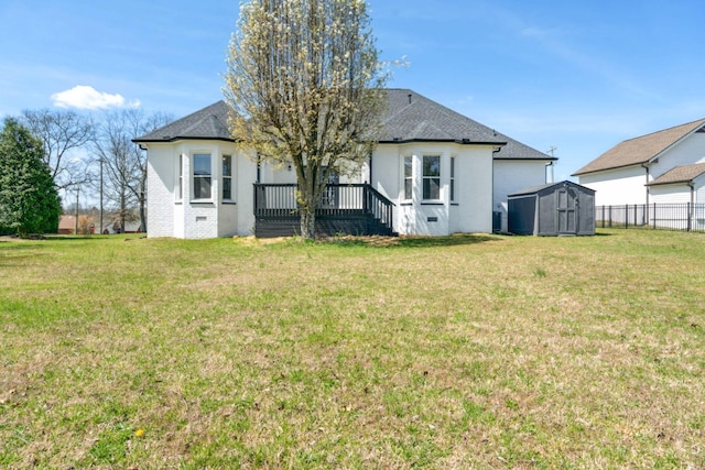 102 Highland Rdg, Hendersonville, TN 37075 - back of property with an outdoor structure, a storage shed, brick siding, and a yard