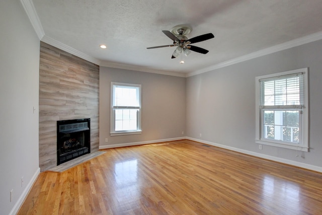 526 Christel Springs Dr, Clarksville, TN 37043 - unfurnished living room with baseboards, ornamental molding, light wood-style flooring, and a ceiling fan