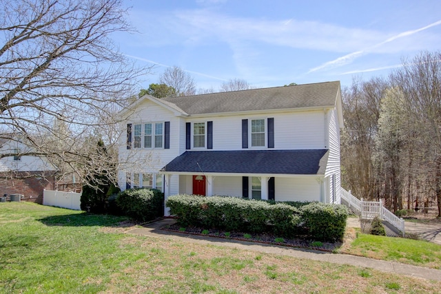 526 Christel Springs Dr, Clarksville, TN 37043 - traditional-style house featuring roof with shingles, fence, and a front lawn