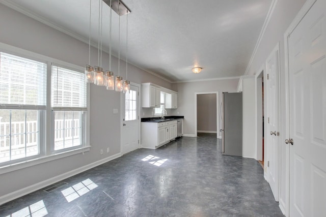 526 Christel Springs Dr, Clarksville, TN 37043 - kitchen with white cabinets, visible vents, baseboards, dark countertops, and stainless steel appliances