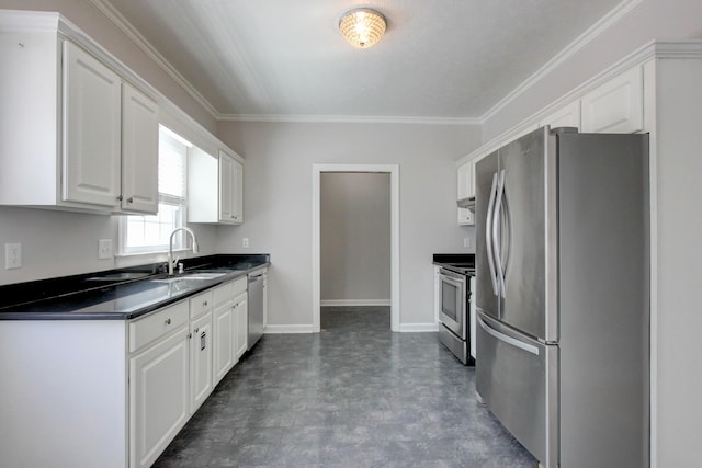 526 Christel Springs Dr, Clarksville, TN 37043 - kitchen featuring dark countertops, white cabinets, a sink, and stainless steel appliances