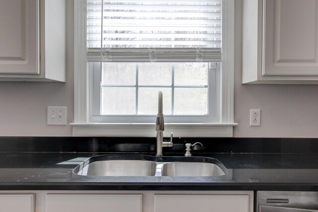 526 Christel Springs Dr, Clarksville, TN 37043 - kitchen featuring white cabinetry, a sink, and dark countertops