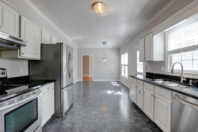 526 Christel Springs Dr, Clarksville, TN 37043 - kitchen featuring extractor fan, a sink, dark countertops, and appliances with stainless steel finishes