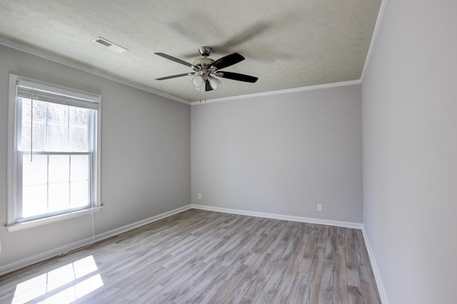 526 Christel Springs Dr, Clarksville, TN 37043 - unfurnished room with a wealth of natural light, visible vents, light wood-type flooring, and ornamental molding