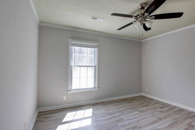 526 Christel Springs Dr, Clarksville, TN 37043 - empty room with ornamental molding, baseboards, light wood finished floors, and visible vents
