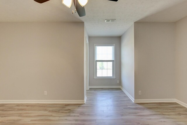 526 Christel Springs Dr, Clarksville, TN 37043 - unfurnished room featuring baseboards, visible vents, light wood-style floors, and a ceiling fan