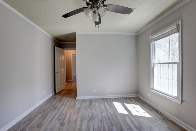 526 Christel Springs Dr, Clarksville, TN 37043 - spare room with wood finished floors, a healthy amount of sunlight, and a ceiling fan