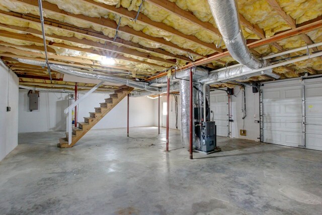 526 Christel Springs Dr, Clarksville, TN 37043 - below grade area with electric panel, stairs, and heating unit