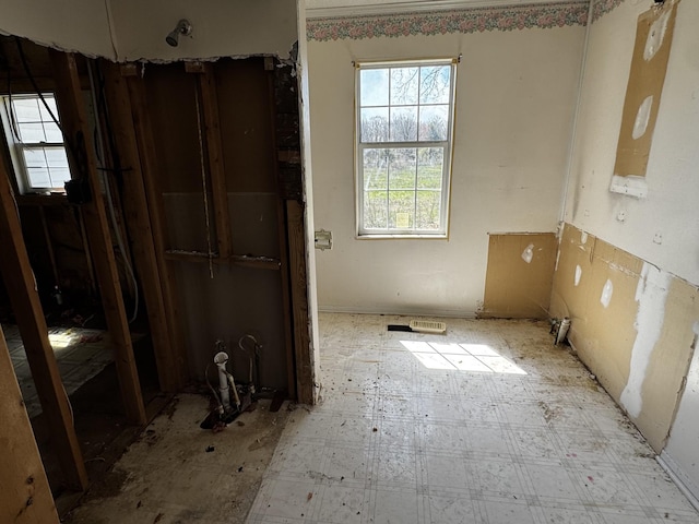 interior space with tile patterned floors
