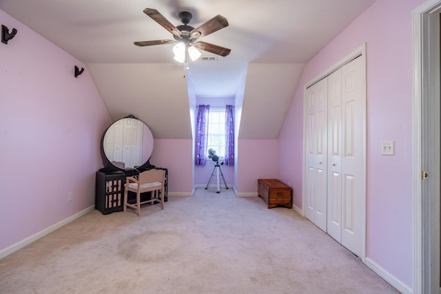 bonus room featuring baseboards, carpet floors, ceiling fan, and vaulted ceiling