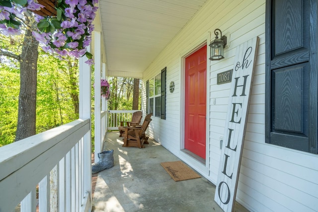 entrance to property featuring a porch